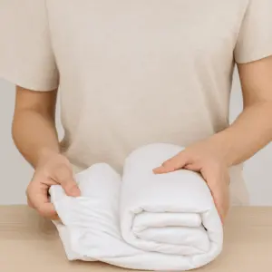 como doblar sabanas bajeras
