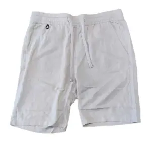 pantalones lino beige hombre